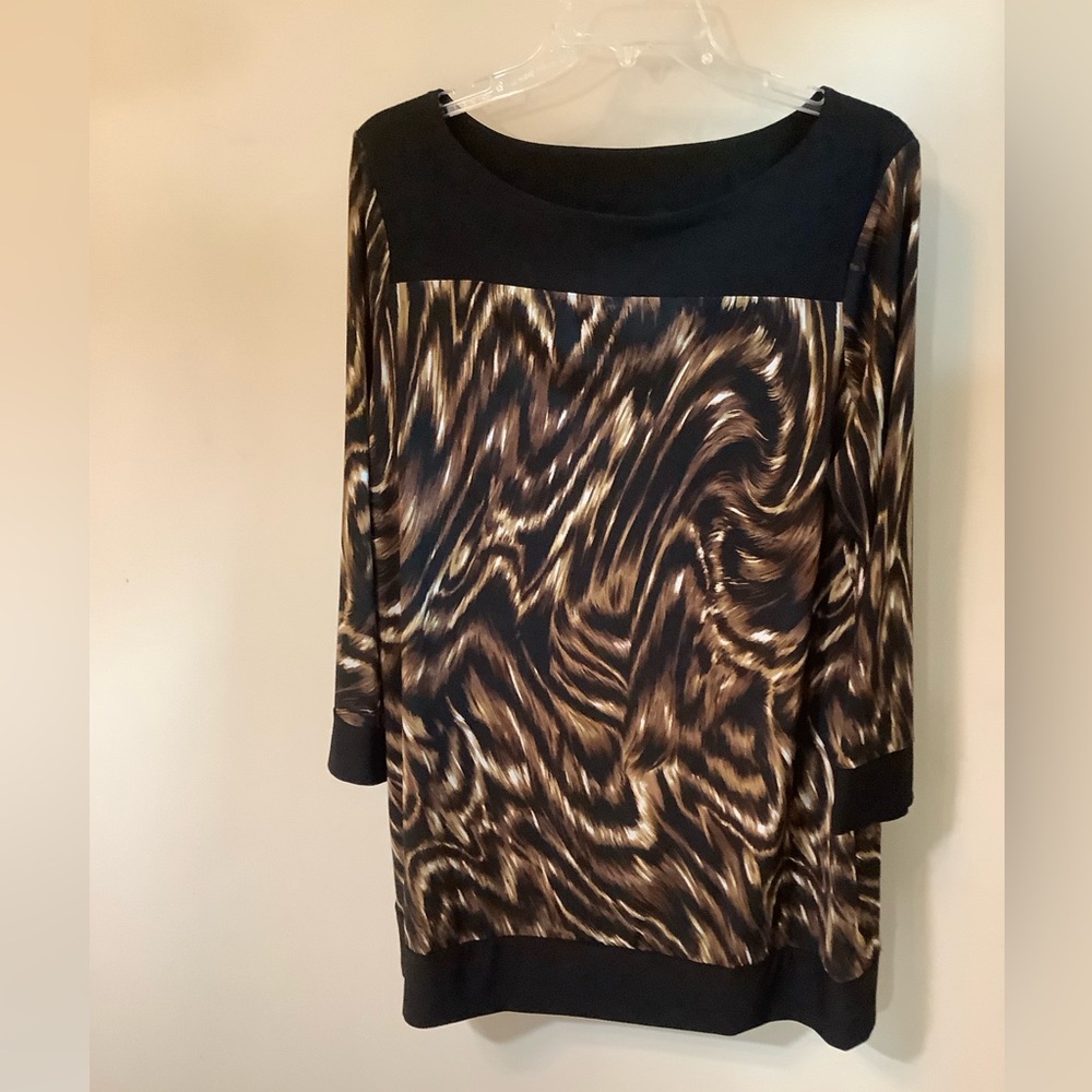 Cato Woman swirl print tunic with black trim neck,wrists &bottom like new 14/16W